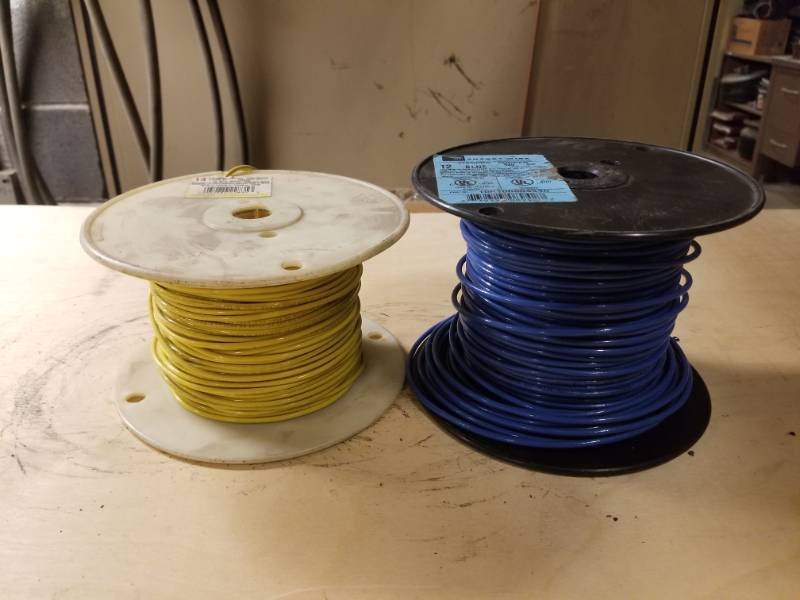 lot 8104 image: 14 Yellow and 12 Blue Stranded Copper Wire Spools