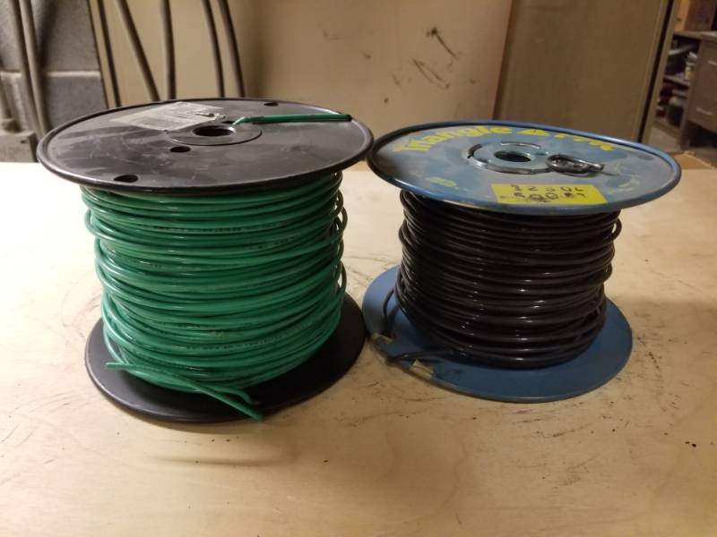 lot 8106 image: 12 Green and Black Wire Spools