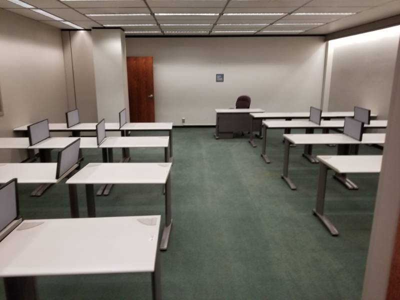 lot 9815 image: Room Full of Testing Desks Work Tables