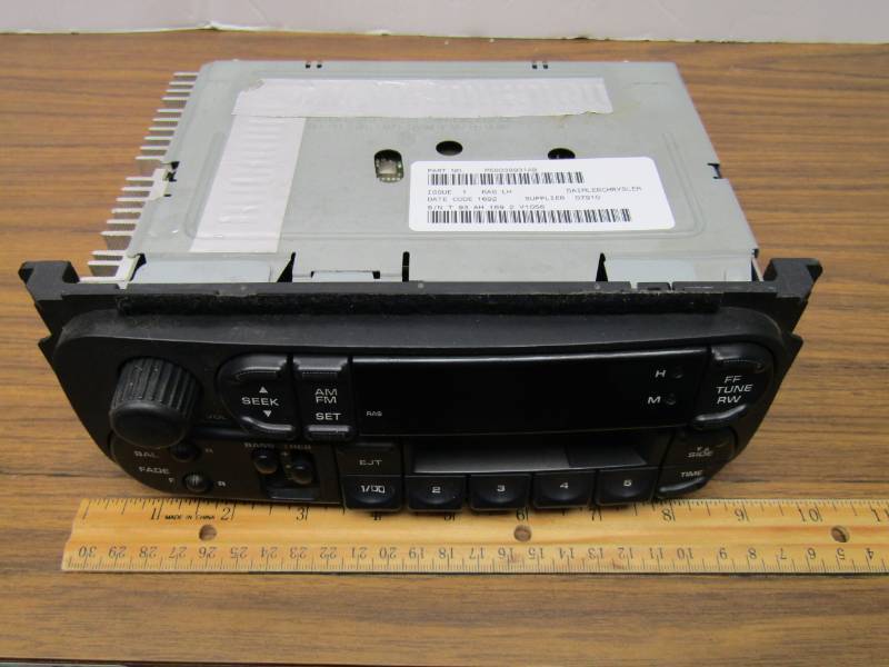 lot 3304 image: Chrysler Dodge Jeep 98 - 02 Factory AM FM Radio Cassette Player P56038931AB Ram