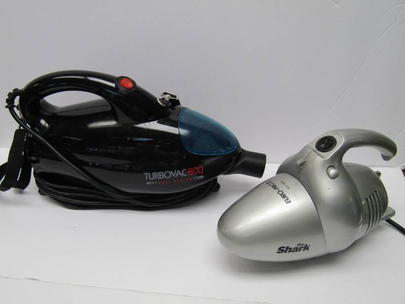 lot 3317 image: Shark and Turbo Pro Handheld Vacuums