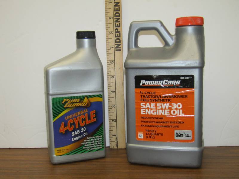 lot 3431 image: 4 Cycle Oil & Lawn and Tractor Synthetic Oil-  Both New and Sealed