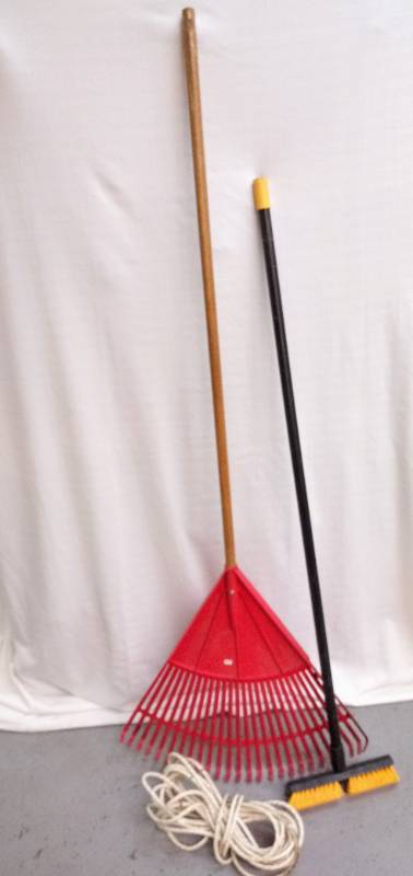 lot 3458 image: Leaf Rake  Scrub Brush and Extension Cord