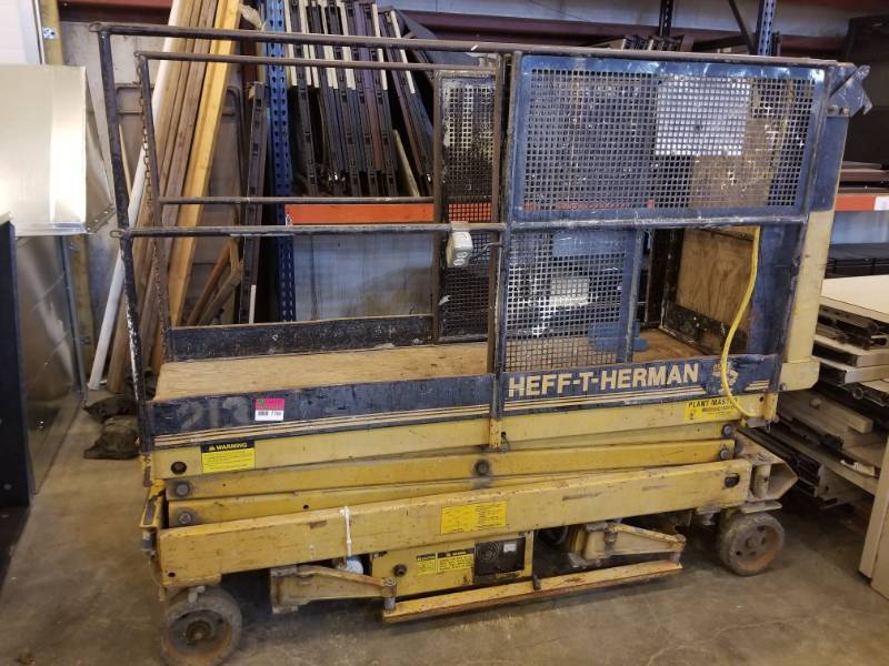 lot 7760 image: Heff-T-Herman Scissor Lift 215SPEP