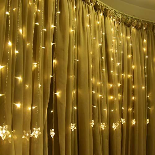 lot 0916 image: TOFU Star Curtain String Light, 100 LED Window Curtain Lights Plug in Curtain String Lights with 10 Stars 8 Flashing Modes Decoration for Wedding, Bedroom,Birthday (Warm White)