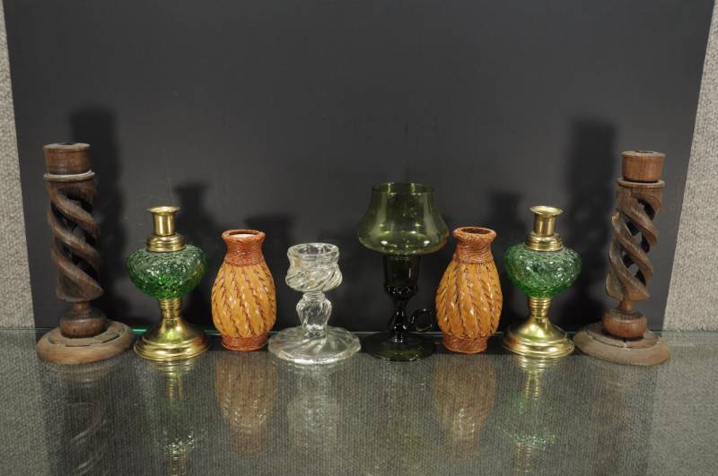 lot 2004 image: Lot of Candle Sticks. 3 Pairs 2 Individual Made of Wood, Glass, Brass and Ceramic. From 4.5 to 8.5 Tall.