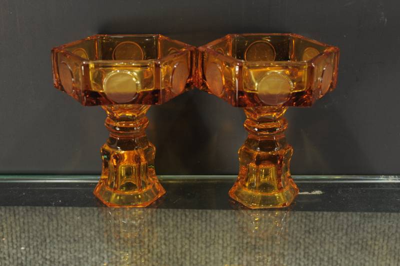 lot 2021 image: Set of Amber Glass Candlesticks with Coin Pattern