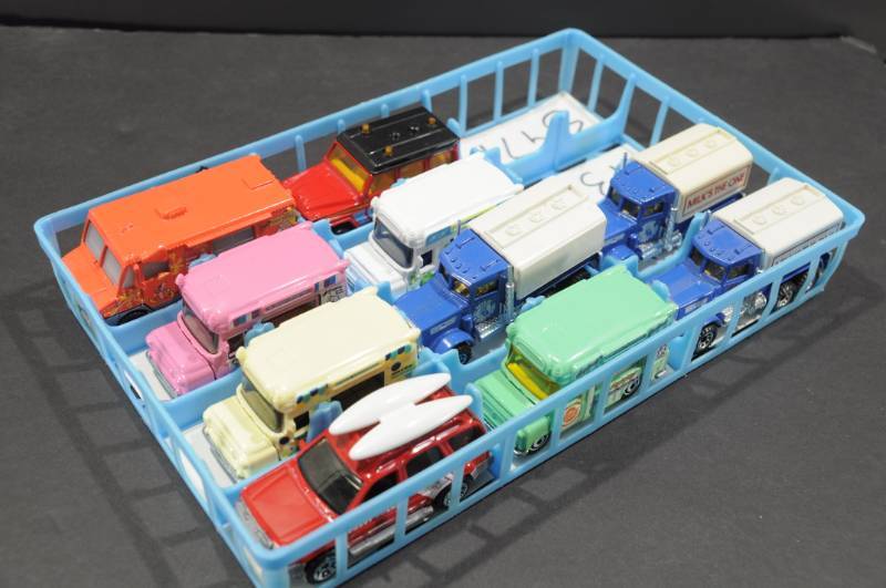 lot 2050 image: Lot of Assorted Matchbox Cars Ice Cream Trucks, Panel Truck, etc.