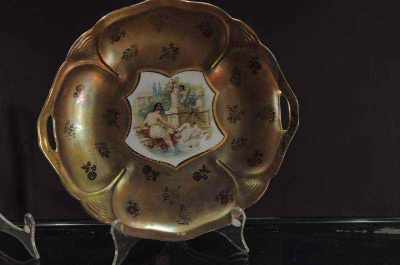 lot 2198 image: Bavarian Style Transfer Image Plate 2 Handles. Zuse and Leda Story 10.25 Chip and some wear.