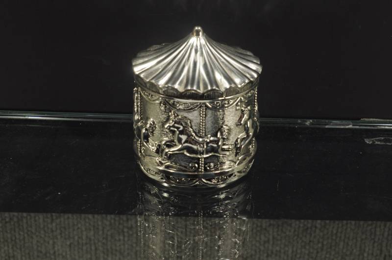 lot 2225 image: Cast Metal Carousel Bank. 3 34X3 3 18