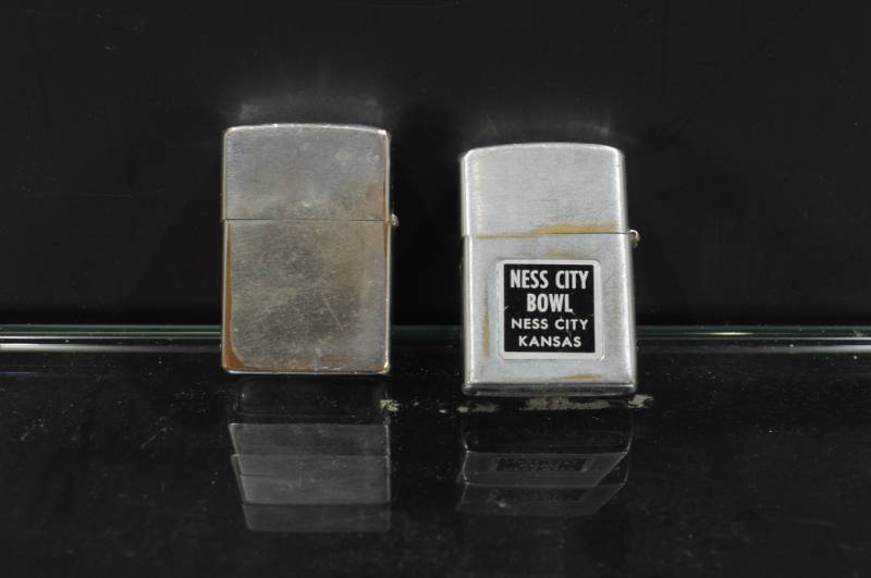 lot 2264 image: Lot 2 Vintage Lighters. Ness City Bowl Hestia, and Zippo Brand