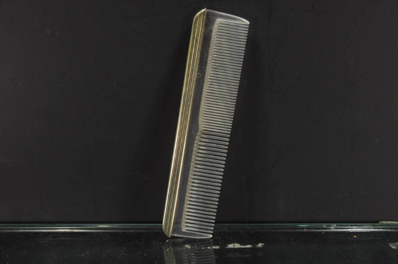 lot 2265 image: Made in U.S.A. Vanity Comb Metal Spine Cover 7
