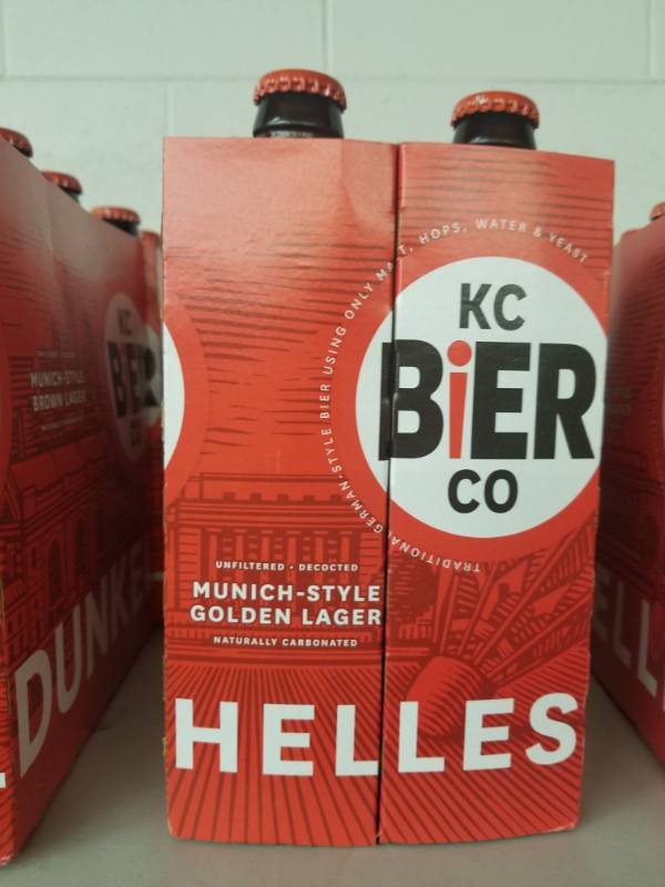 lot 15031 image: (1) KC Bier Helles 6PK, (2) KC Bier Hefe-Weizen 6PK