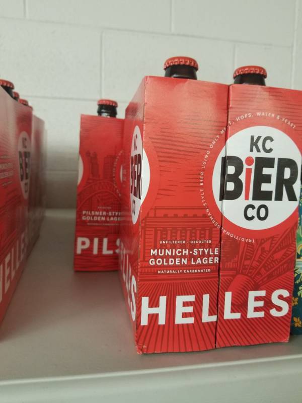 lot 15032 image: (1) KC Bier Helles 6PK, (2) KC Bier Pils 6PK
