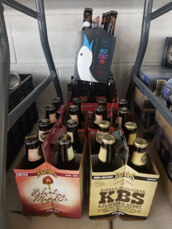 lot 15058 image: (4) Founders 4PK Beer, (3) Goose Island Next Coast IPA
