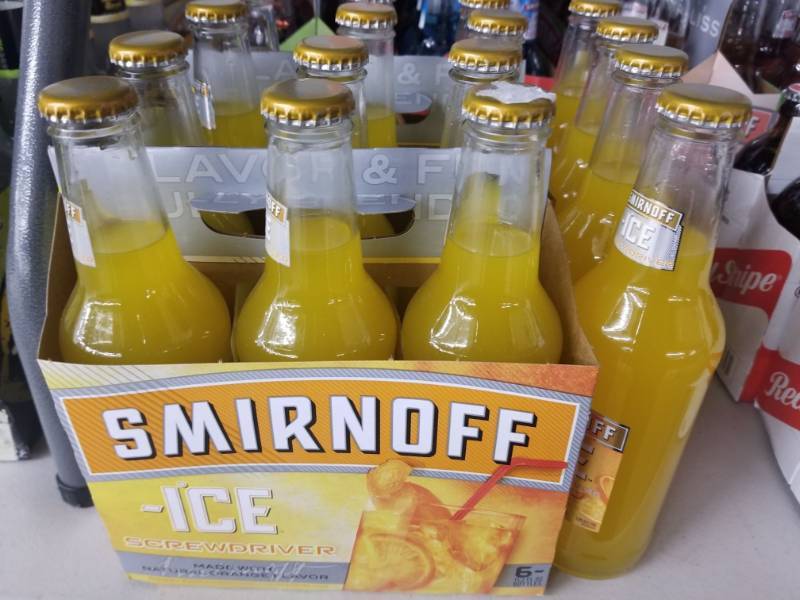 lot 15071 image: (2) Smirnoff Screwdrivers, 4 Single Bottles