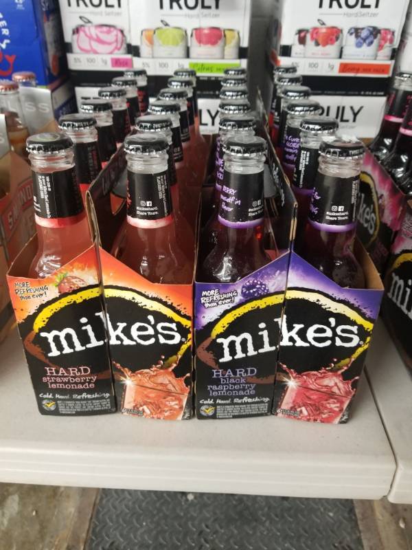 lot 15081 image: (2) Mikes Hard Strawberry Lemonade 6Pk, (2) Mikes Hard Black Rasberry Lemonade