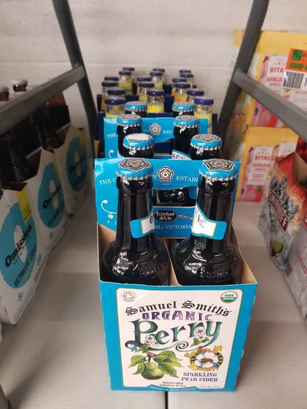 lot 15087 image: (2) Samual Smiths Organic Perry, (3) Twisted Tea Original