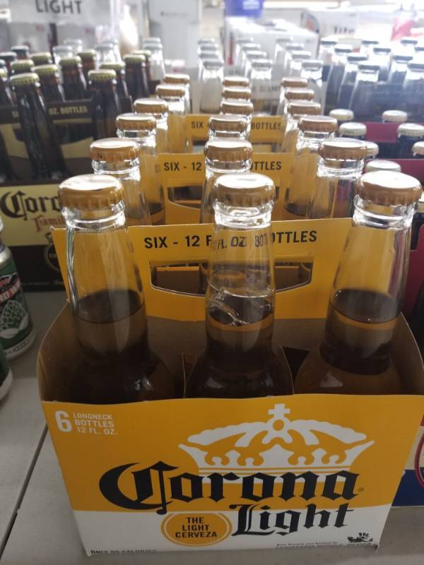 lot 15125 image: (3) Corona Light 6Pk Bottles