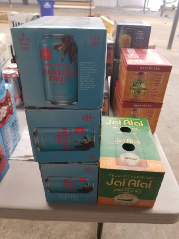 lot 15136 image: (3) New Belgium Passion Fruit 6pk, (1) Cigar City Brewing Jai Alai 6pk