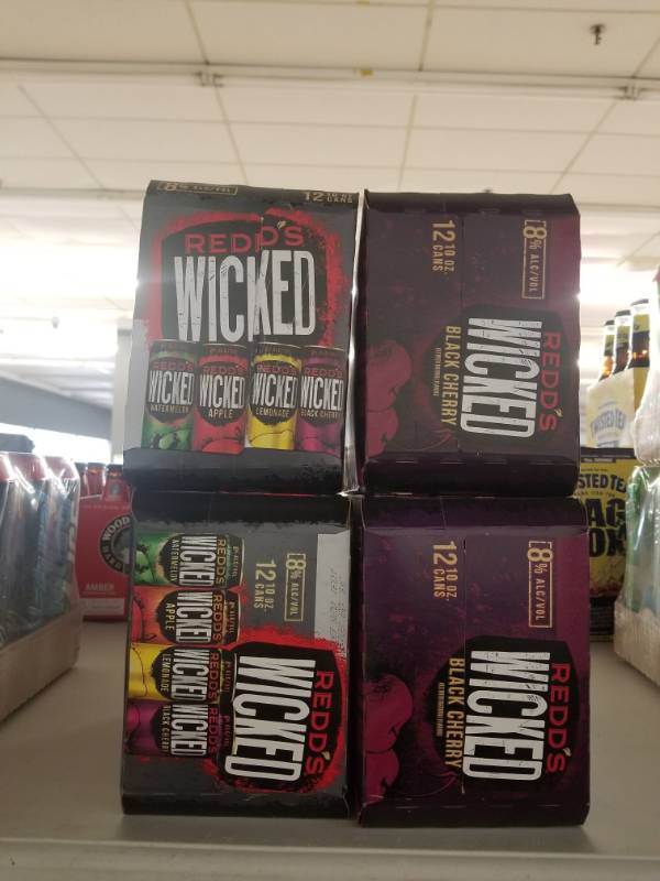 lot 15151 image: (4) 12pk Redds Wicked Variety, Black Cherry