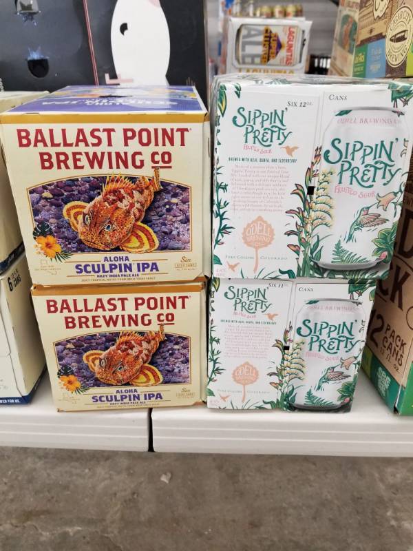 lot 15190 image: (2) Sipping Pretty Fruited Sour 6pks, (2) Ballast Point Sculpin IPA 6pks