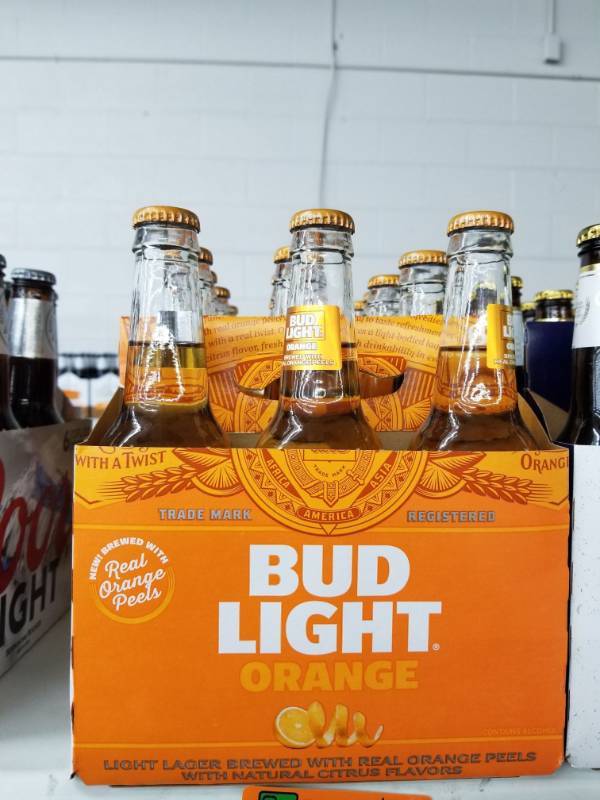 lot 15205 image: (3) Bud Light Orange 6Pk Bottles