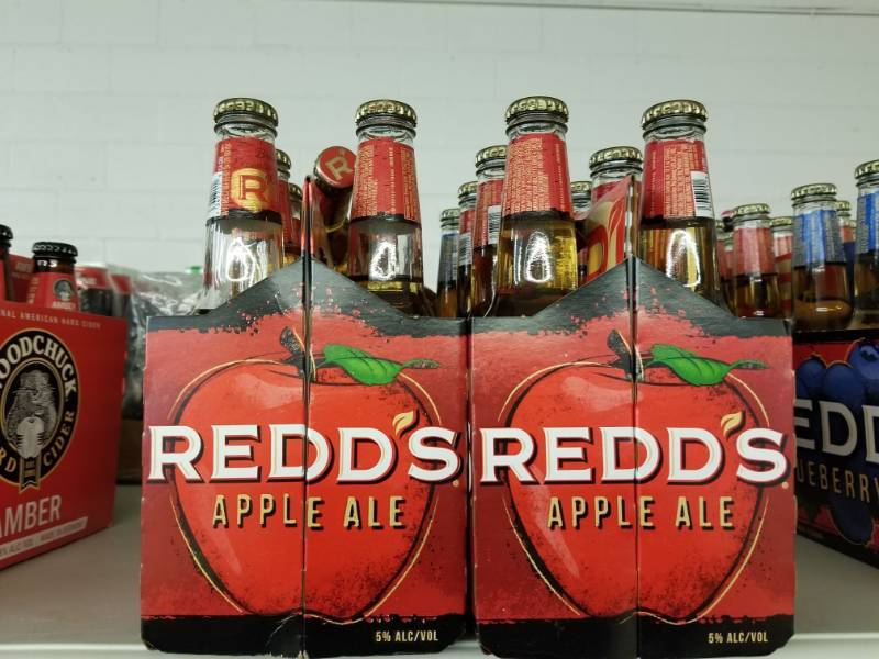 lot 15225 image: (2) Redds Apple Ale 6pks, (1) Pineapple, (1) Blueberry
