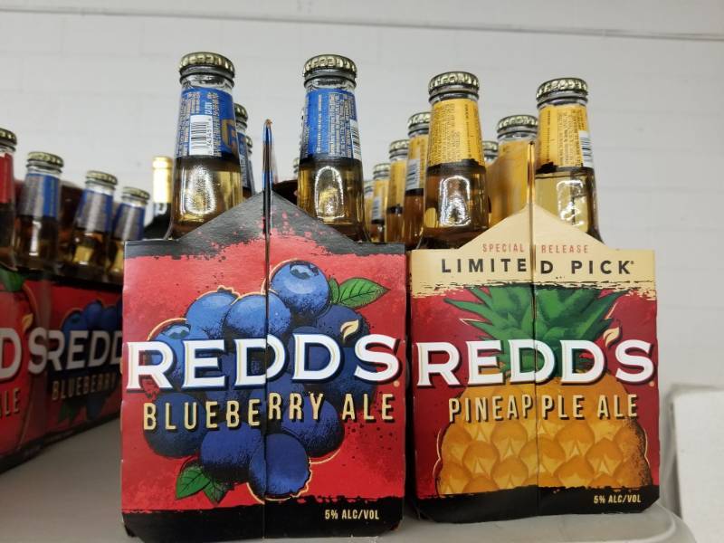 lot 15226 image: (2) Redds Pineapple Ale 6pks, (1) Blueberry, (1) Apple 6pk