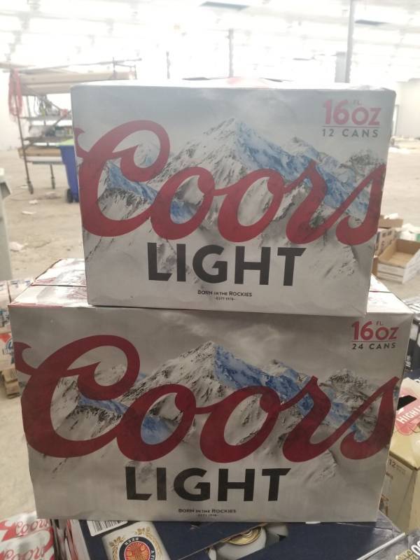 lot 15319 image: (1) 24Pk Coors Light 16oz Cans, (1) 12Pk 16oz Coors Light Cans