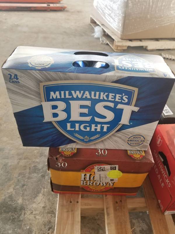 lot 15375 image: (1) 24Pk Milwaukees Best Light Cans, (1) 30PK Honey Brown Cans
