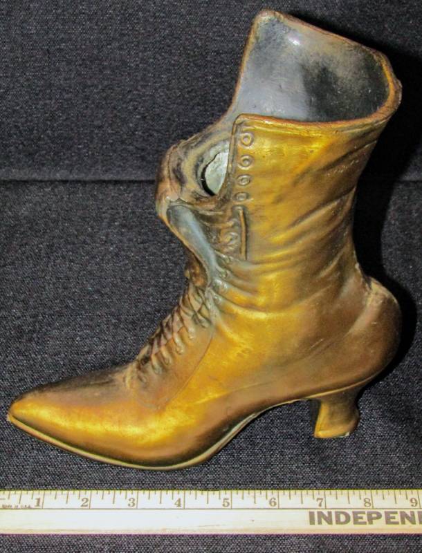 lot 5387 image: Cast iron or Brass  Shoe Planter