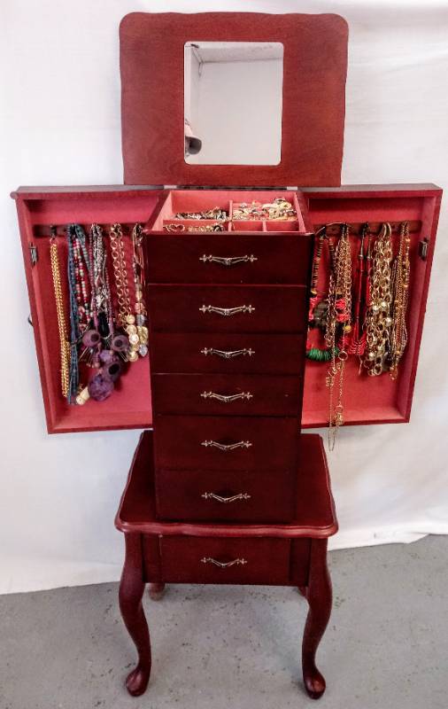 lot 22 image: Stand Up Jewelry CabinetCase  Contents Included  Jewelry Galore-  Treasures