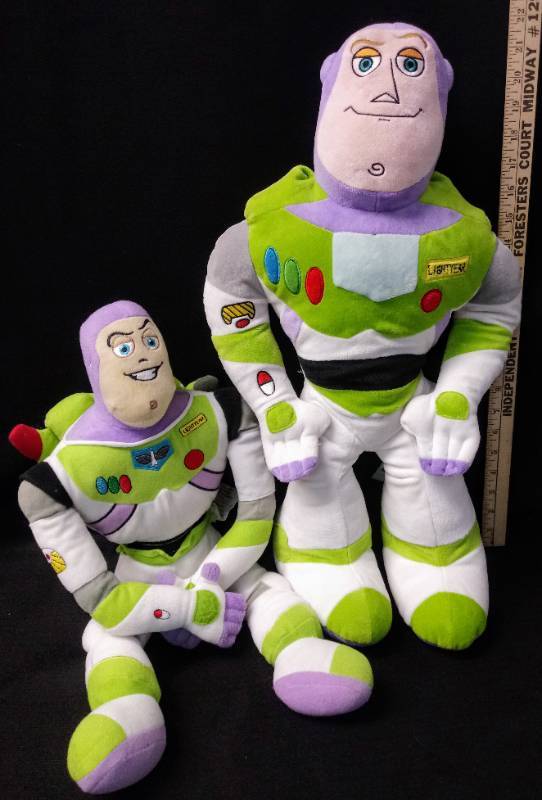 lot 5686 image: 2 Buzz Lightyear Plush Dolls   To Infinity and Beyond