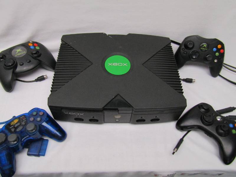 lot 5502 image: XBOX Video Game Console With Controllers