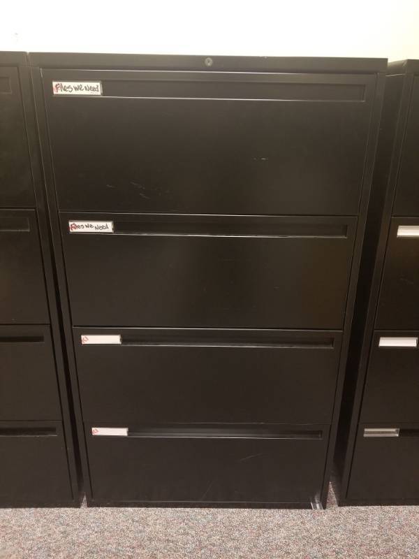 lot 1893 image: 4 Tier Metal File Cabinet