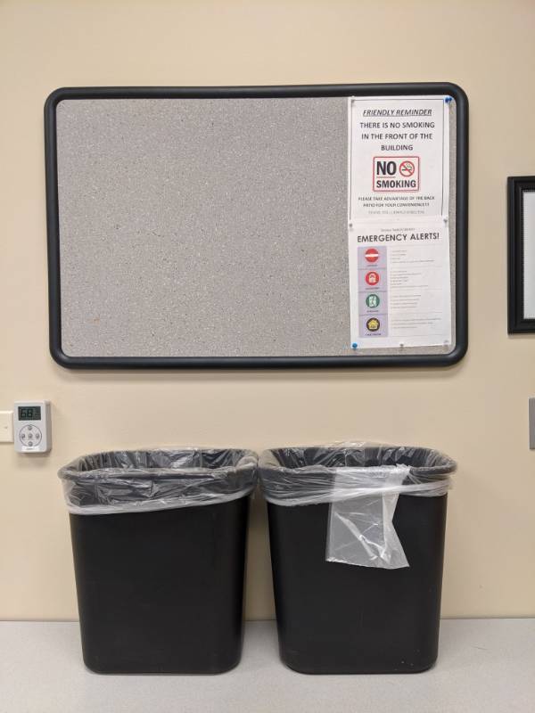 lot 1418 image: Bulletin Board With Two 28 Quart Trash Cans