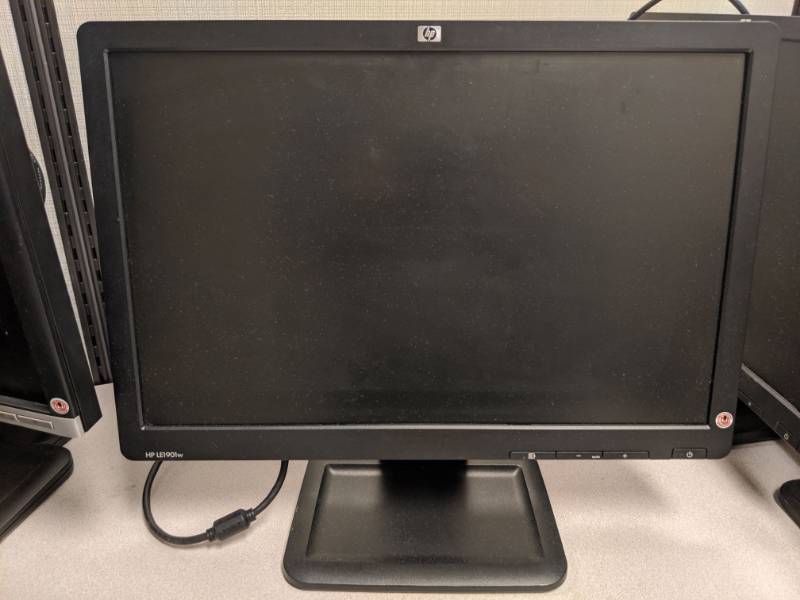 lot 1309 image: (2) HP LE1901W 19 Inch Monitor