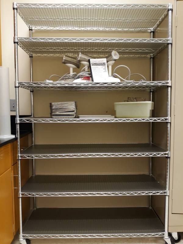 lot 6514 image: Rolling Metal Rack Contents not included