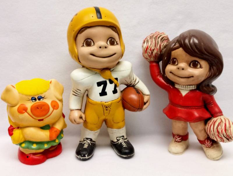 lot 5767 image: 1970s Atlantic Mold Ceramic Painted Football Player & Cheerleader  Bonus Piggy Bank