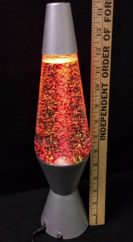 lot 5597 image: Color Changing Lava Lamp- GROOVY MAN