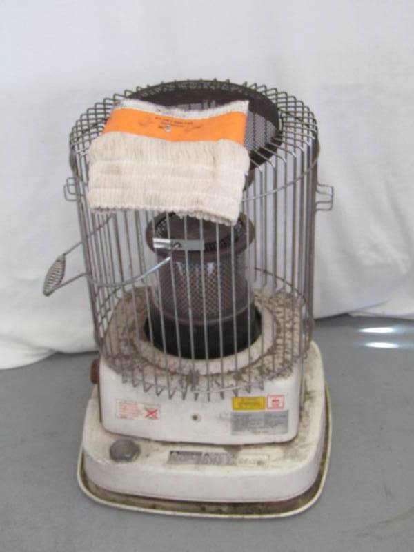 lot 5615 image: Kerosene Radiant Heater With Extra Wick