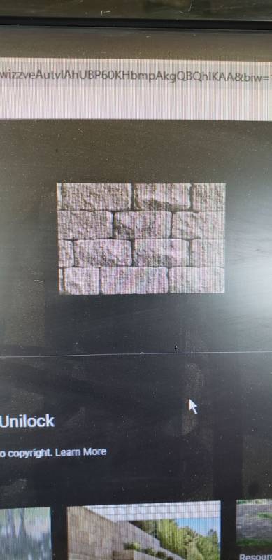 lot 2578 image: unilock estate wall 3in random bundle sandstone