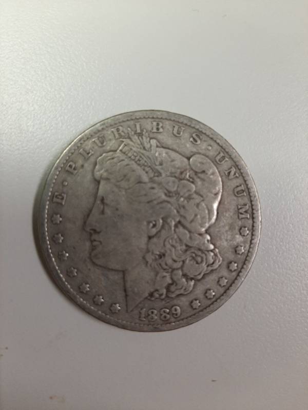 lot 1335 image: 1889-O Morgan silver dollar