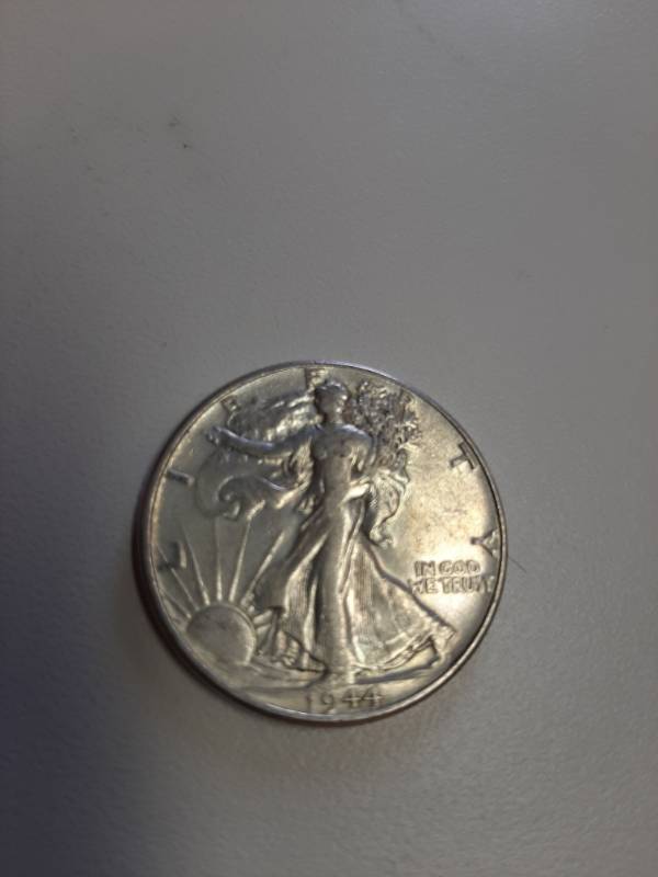 lot 1379 image: 1944 Walking Liberty silver half dollar