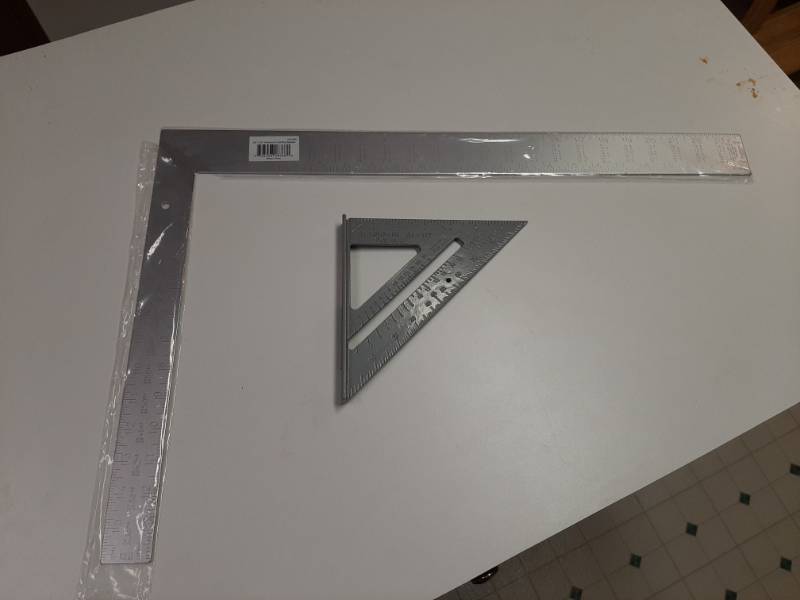lot 1446 image: Aluminum Carpenters Framing Square, 24  X 16  and 7  Rafter Square