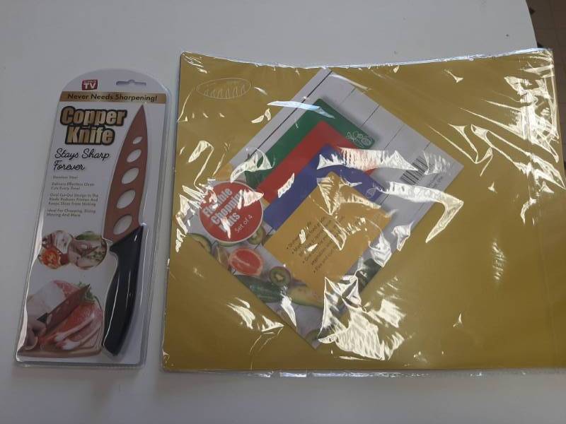 lot 1452 image: Copper Knife and set of 4 Flexible Chopping Mats