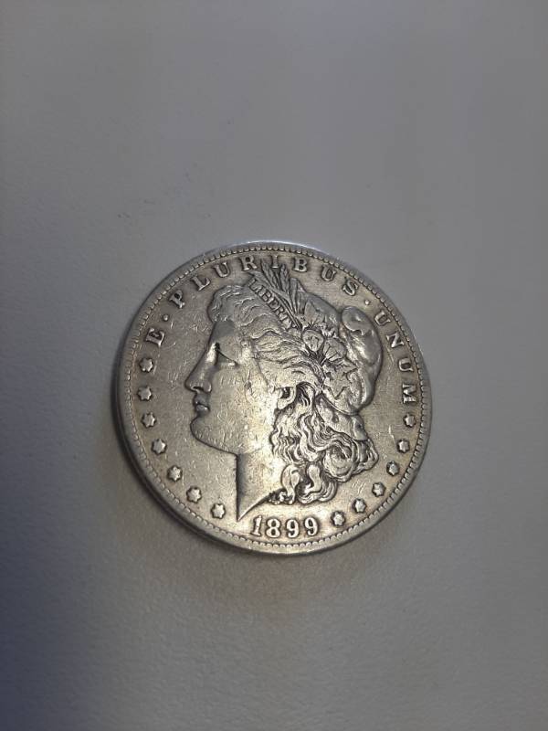lot 1455 image: 1899-O Morgan silver dollar