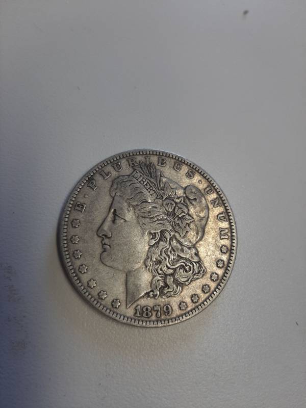 lot 1476 image: 1879 Morgan silver dollar
