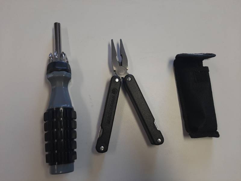 lot 1489 image: Multi tool with case and Multi tip screwdriver